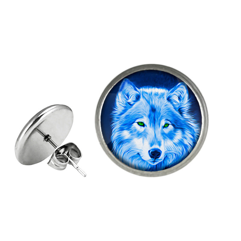 Clous d'oreilles représentant un loup bleu mystique aux yeux perçants, en acier inoxydable, ajoutant une touche de force et de mystère à votre look.