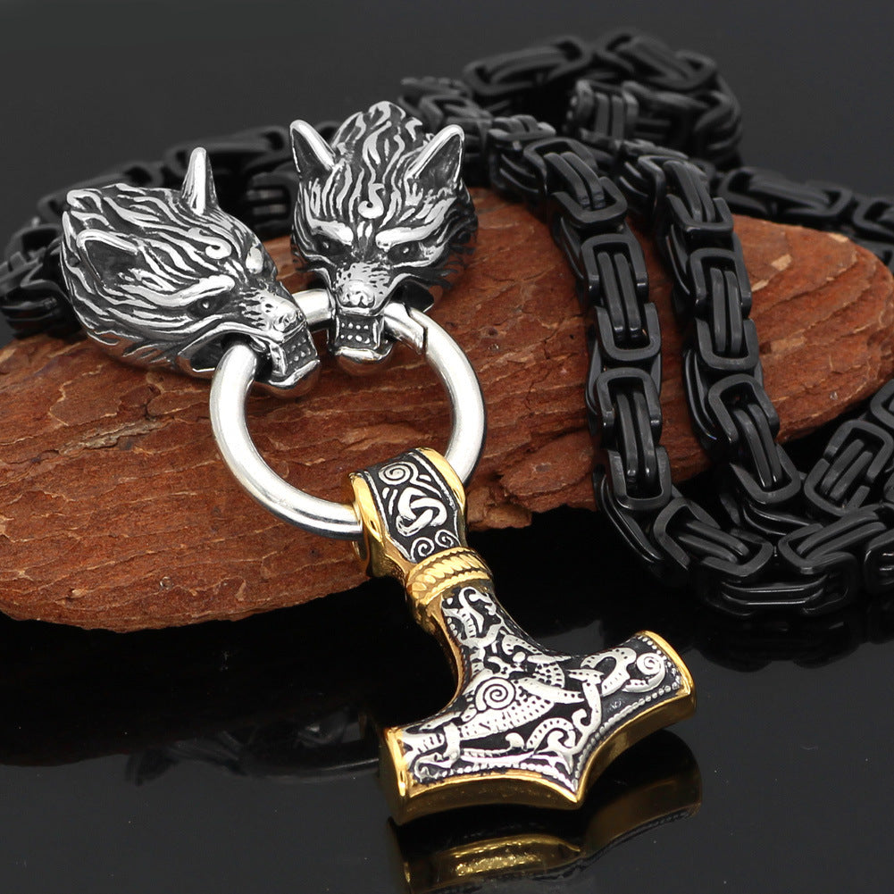 Collier Viking avec Marteau de Thor bicolore, têtes de loup en acier et finitions dorées


